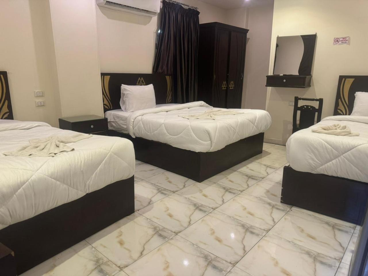 City Pyramids Inn Kafrat al Jabal Bagian luar foto