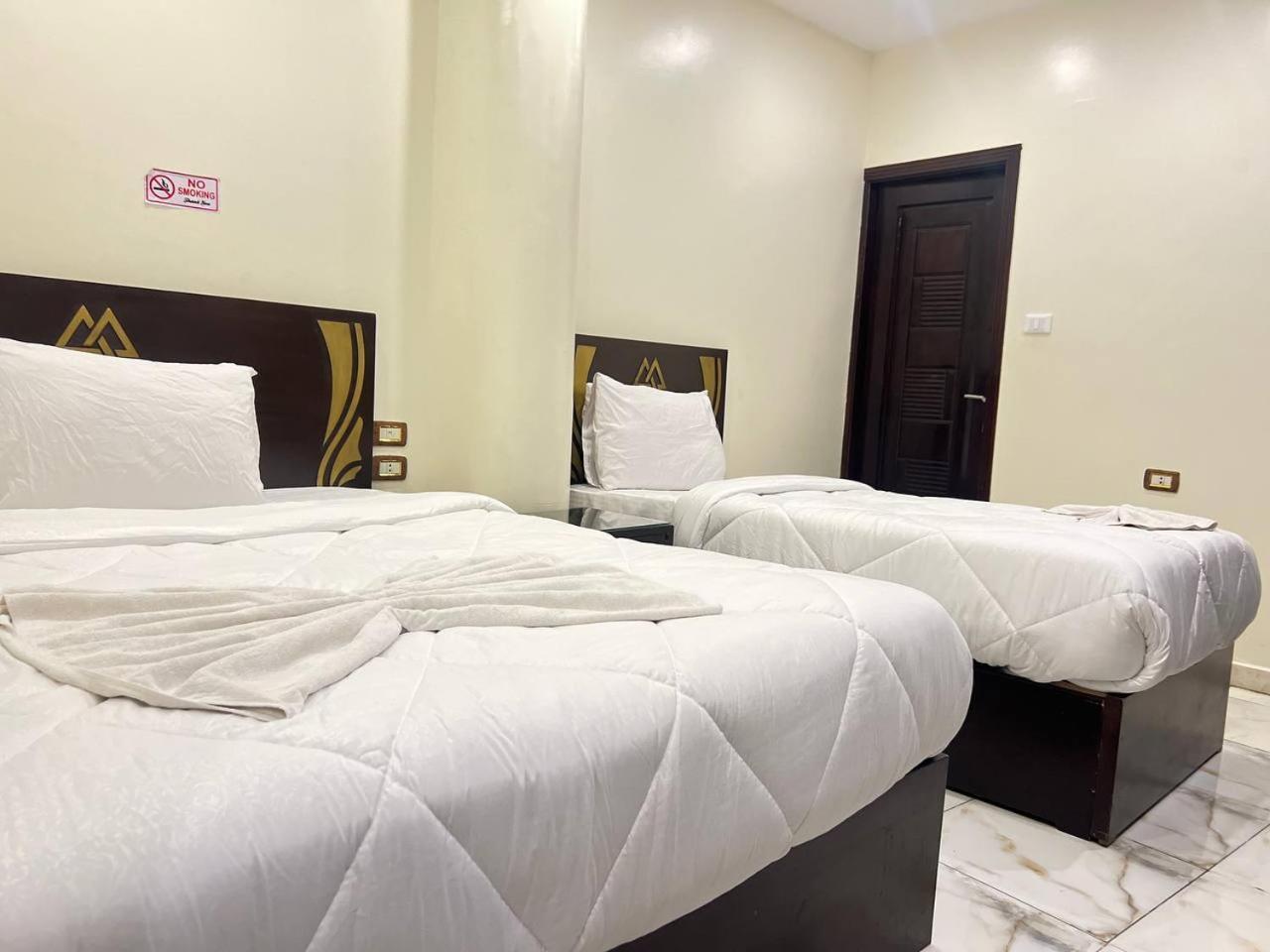 City Pyramids Inn Kafrat al Jabal Bagian luar foto