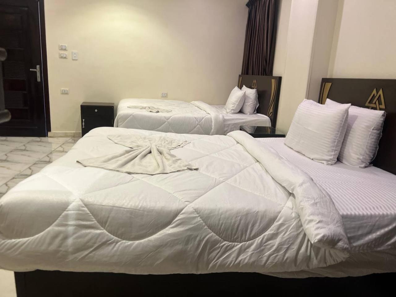 City Pyramids Inn Kafrat al Jabal Bagian luar foto